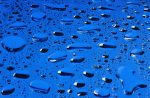 water droplets on blue