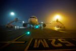 De-icing an aircraft at night