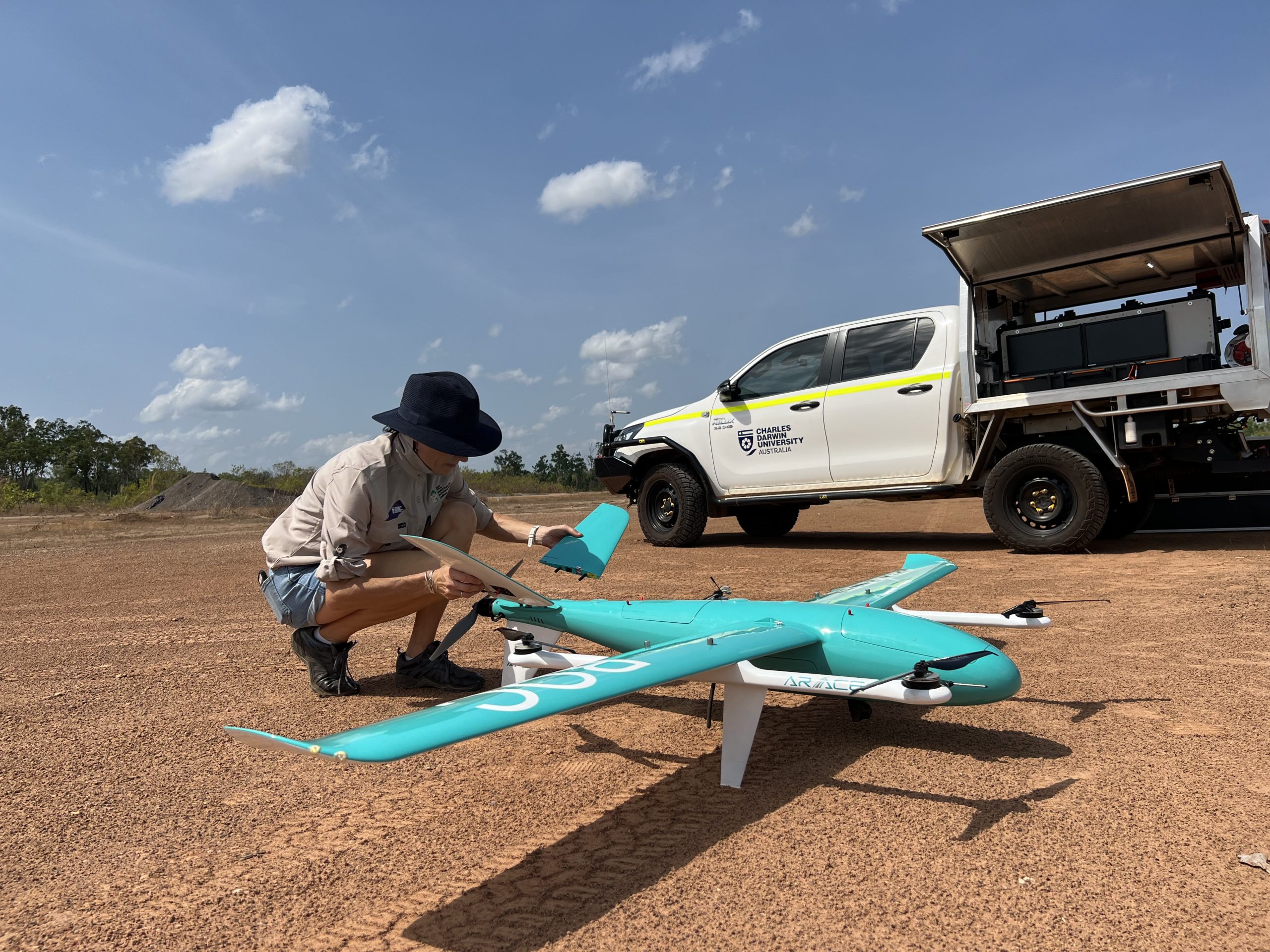 Rebecca conducting a daily pre-flight check on the Arace ROC drone, Darwin (Source: NACAS)